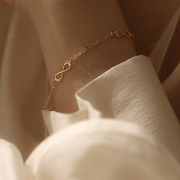 18k Gold-Accented Sterling Silver Infinity Pendant Bracelet - Infinite  Modernity | NOVICA